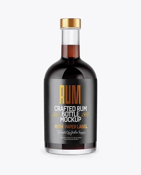 Dark rum bottle and tumbler glass